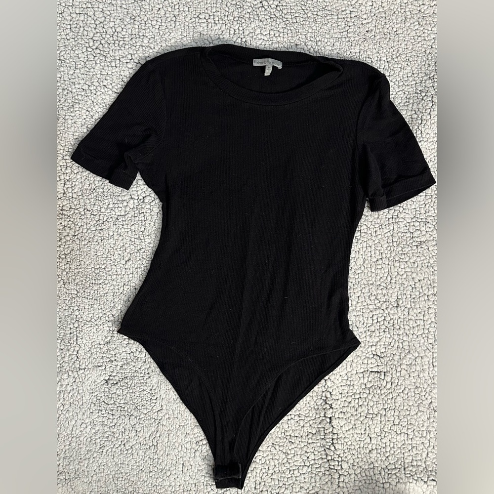 Black shirt sleeve body suit